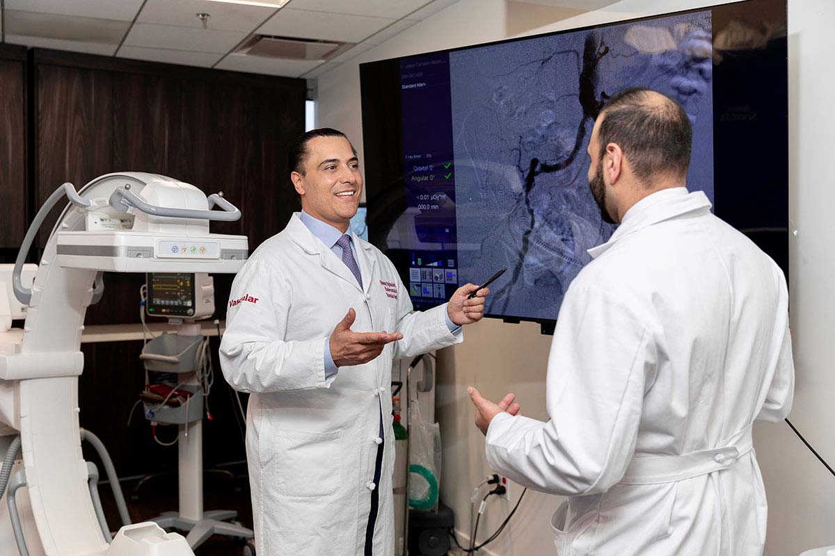 SCMSC surgeons Dr. Sammy Eghbalieh confers with Dr. Andrew Abi-Chaker
