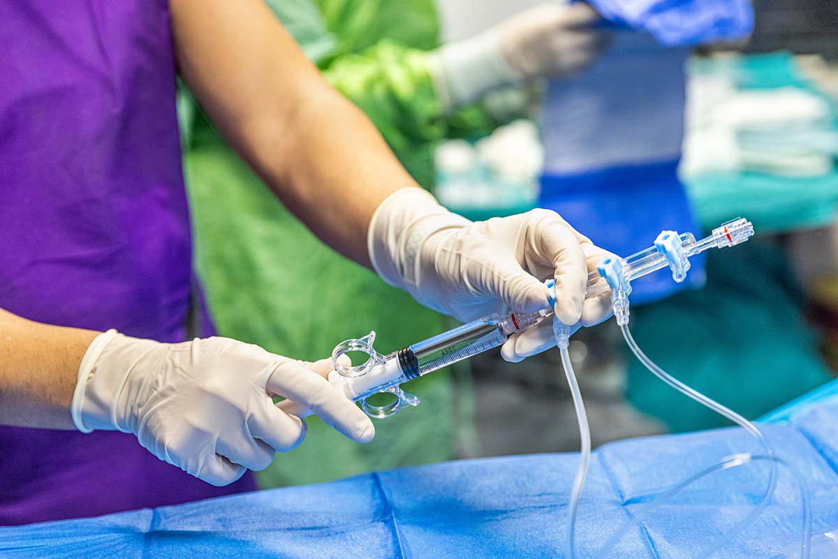 inserting a double lumen catheter into a patient