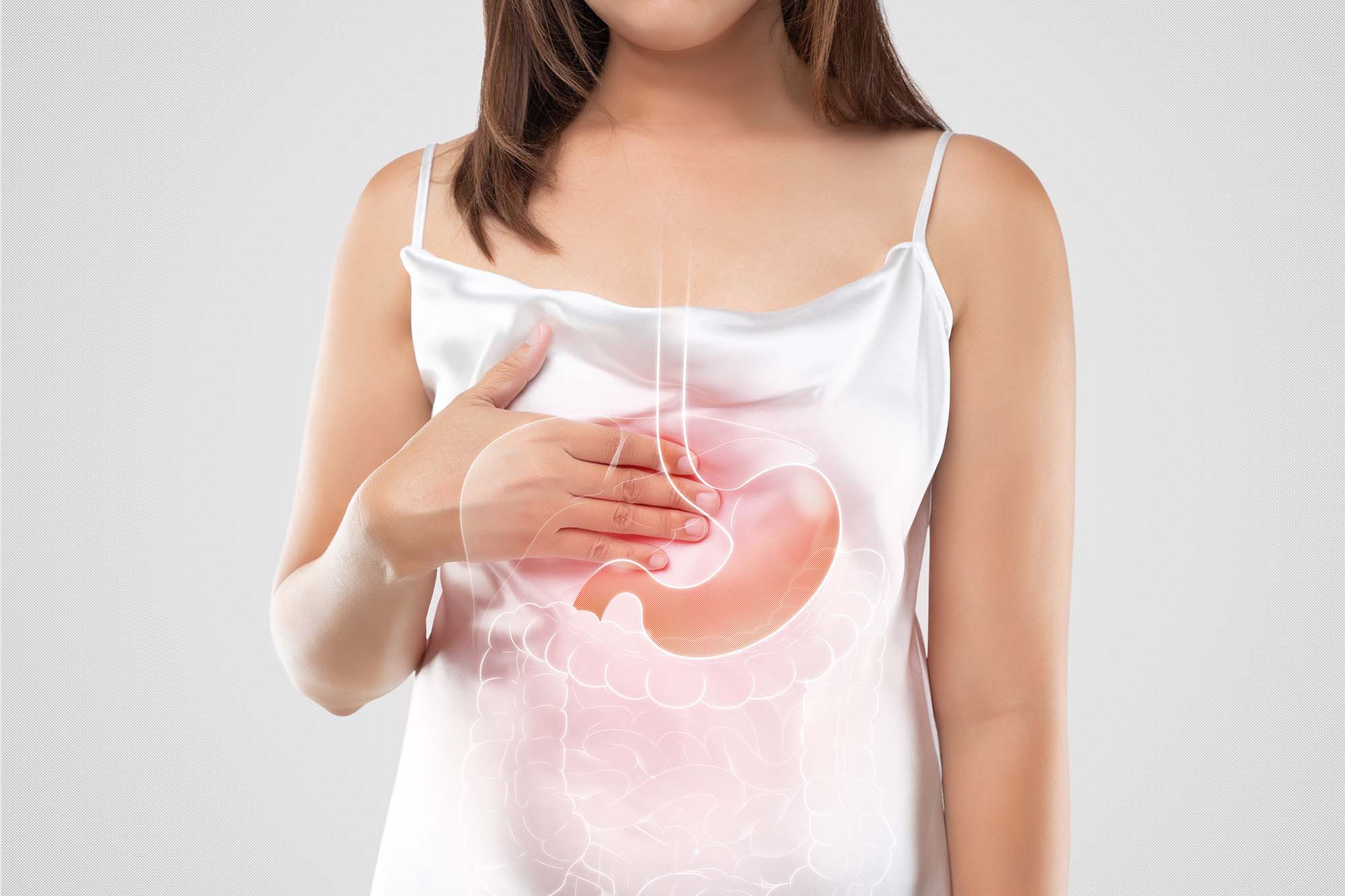 woman suffering from acid reflux Labeled illustration of healthy stomach vs GERD